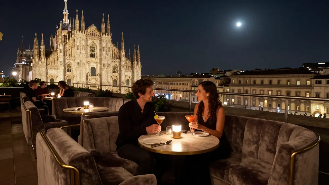 Rooftop lounge with city lights behind a couple sipping cocktails at night.