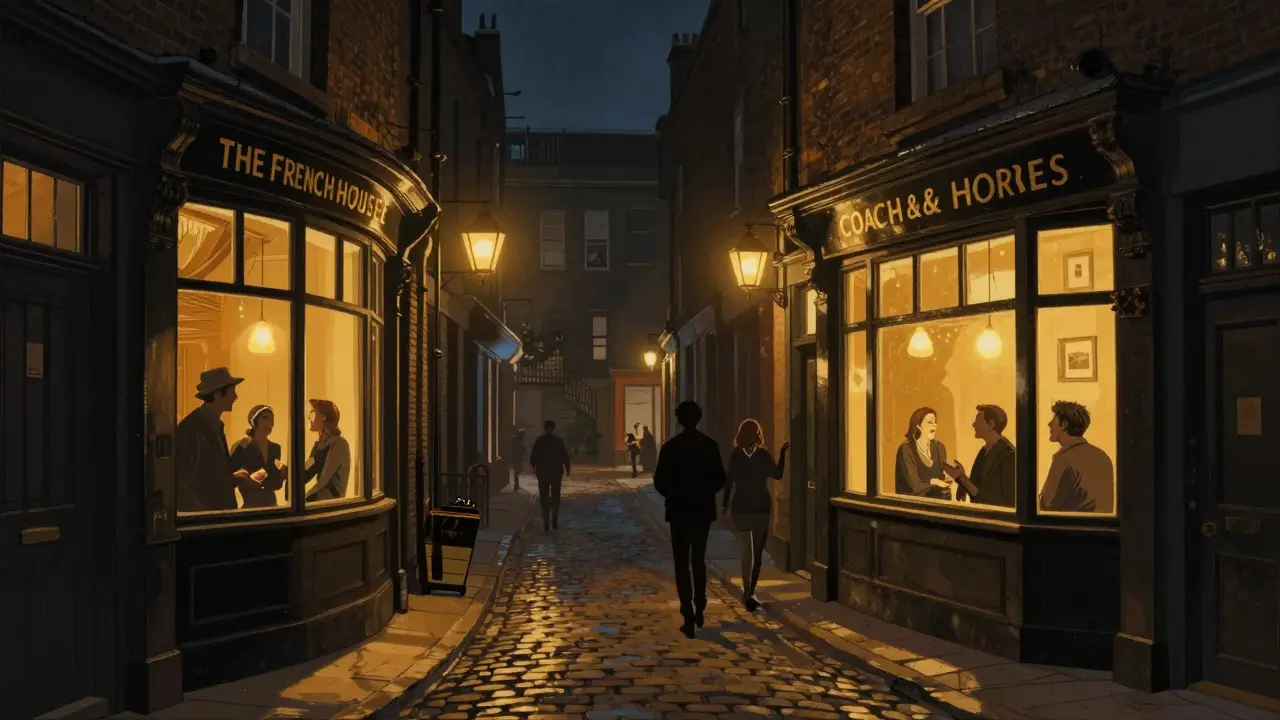 Two iconic Soho pubs at night, glowing with warmth amid wet cobblestones and music drifting from within.